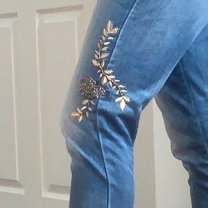 EUC girlfriend jeans. Gold and blue embellishments